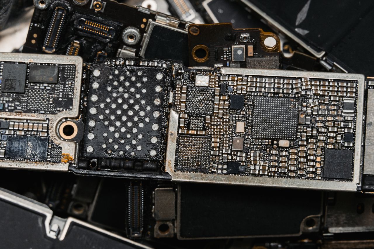 Detailed image of electronic circuit board components, showcasing intricate engineering.